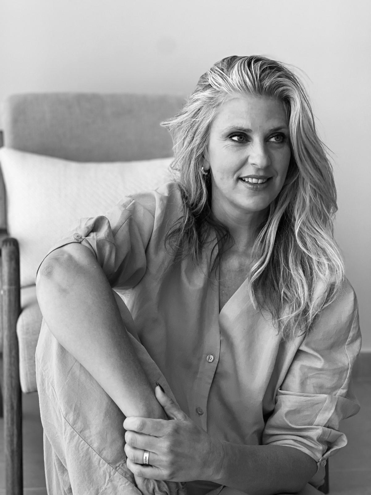 Gayle Berry smiling in conversation
