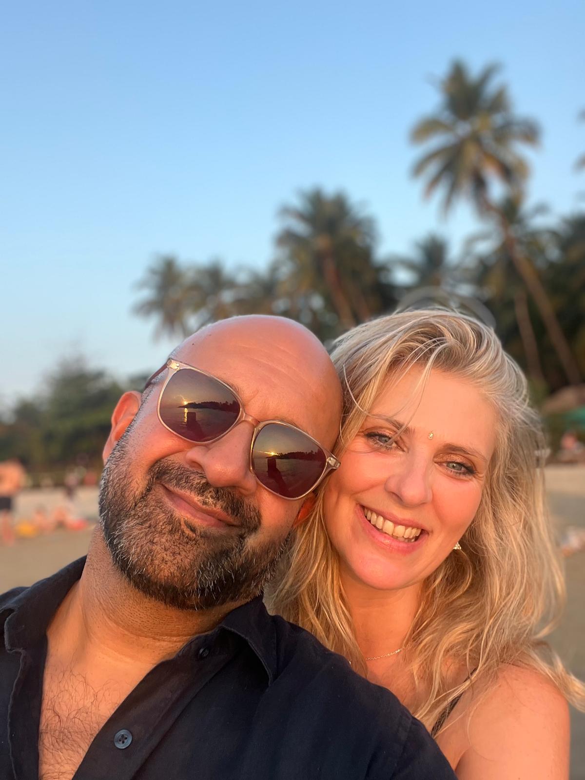 Jigs Patel and Prema on the beach at golden hour
